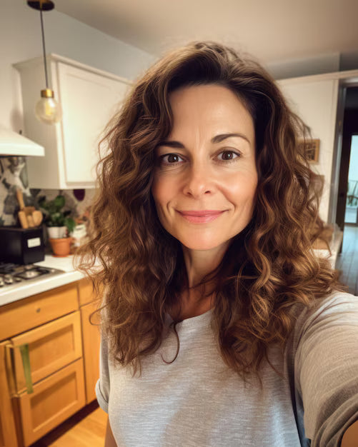 files/happy-middle-aged-woman-taking-selfie-home_719646-10319.avif